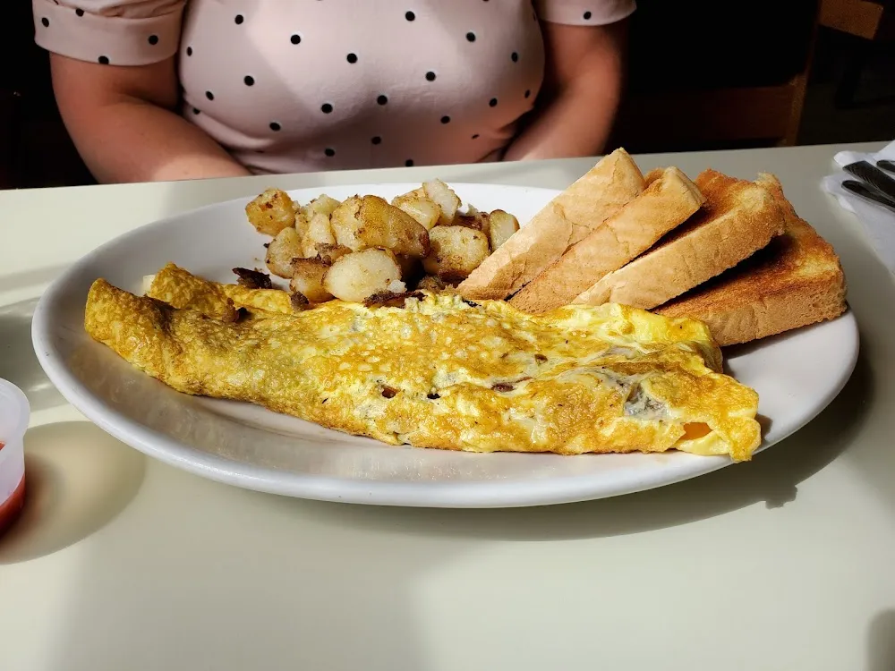 Mushroom Red Pepper Tomato Pepper Jack Cheese with Bacon Omelette